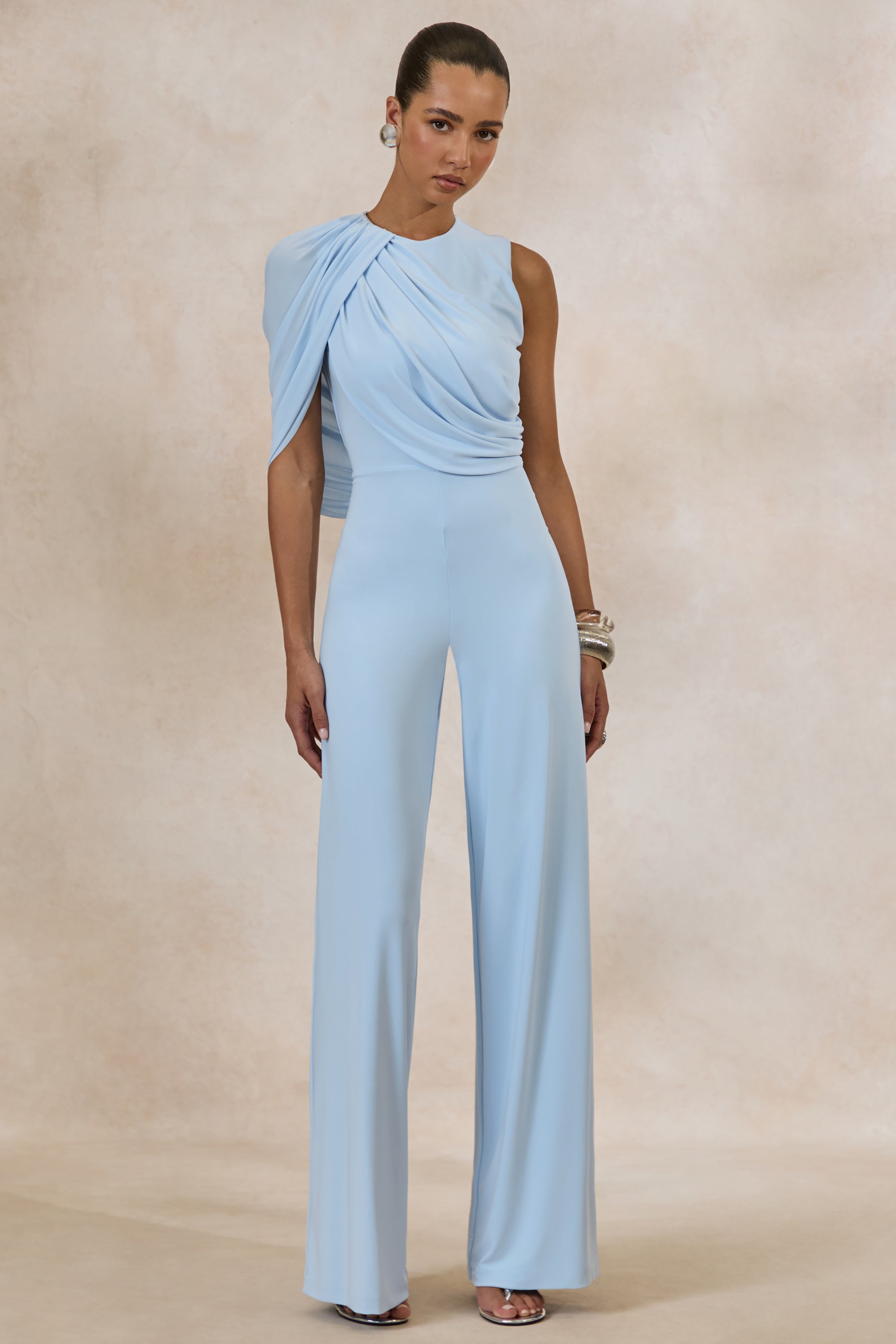 ECM_HR_CL136394013---Opulence-_-Light-Blue-Jumpsuit-With-Cape-Sleeve-and-Draped-Details-0.jpg