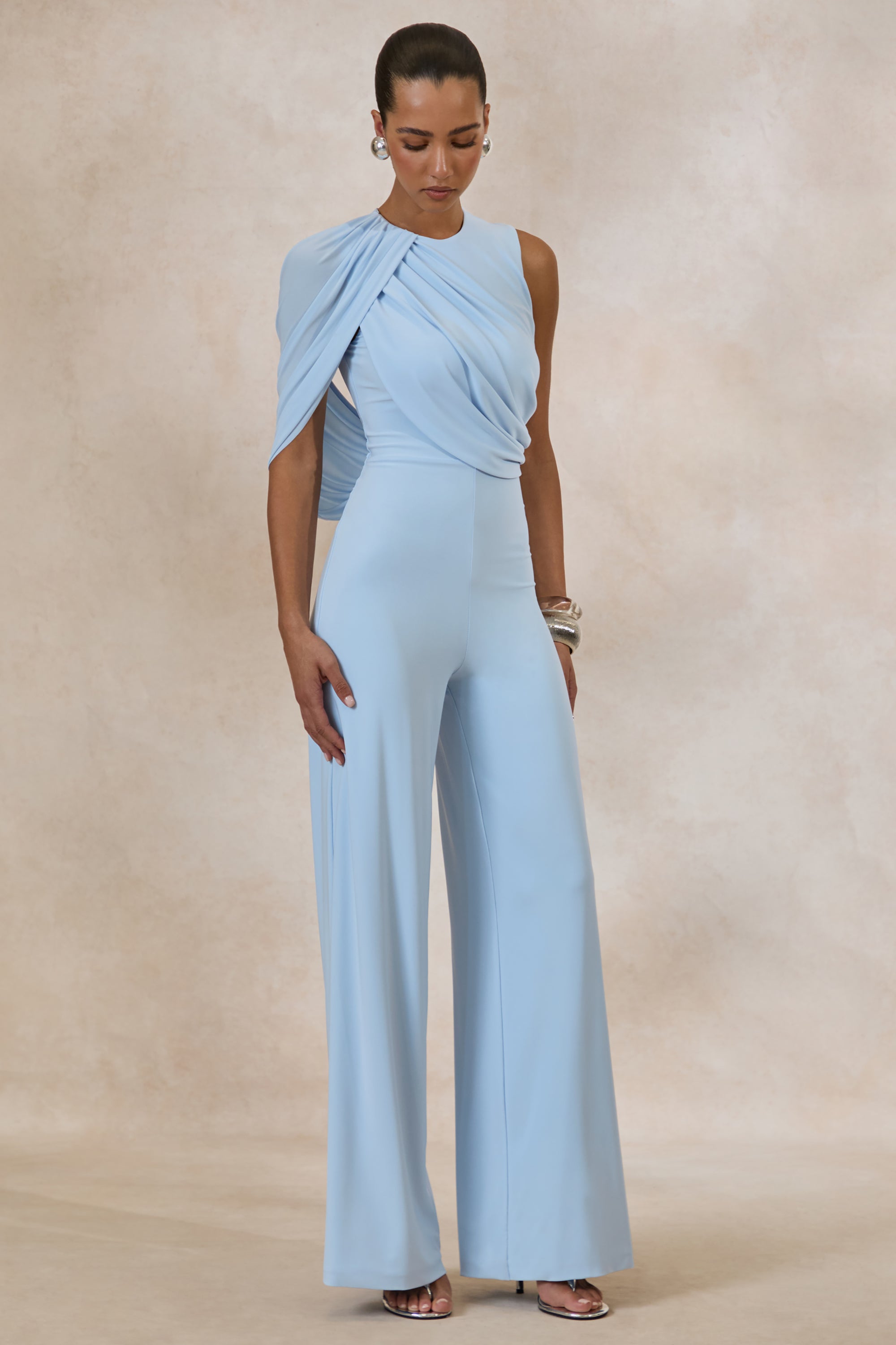 ECM_HR_CL136394013---Opulence-_-Light-Blue-Jumpsuit-With-Cape-Sleeve-and-Draped-Details-1.jpg