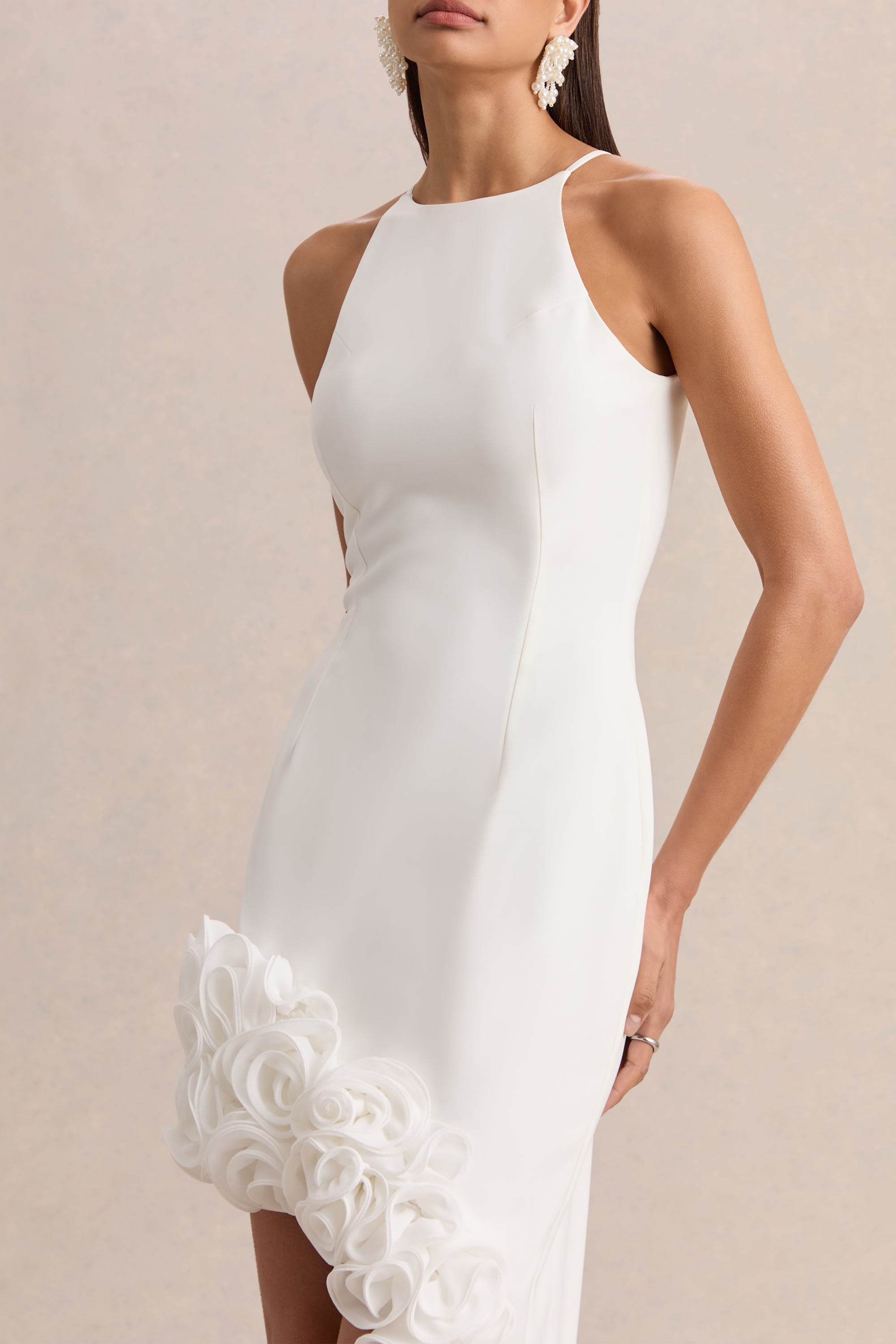 ECM_HR_CL137226110---Indira-_-White-Halter-Neck-Maxi-Dress-With-Asymmetric-Floral-Hem-03.jpg