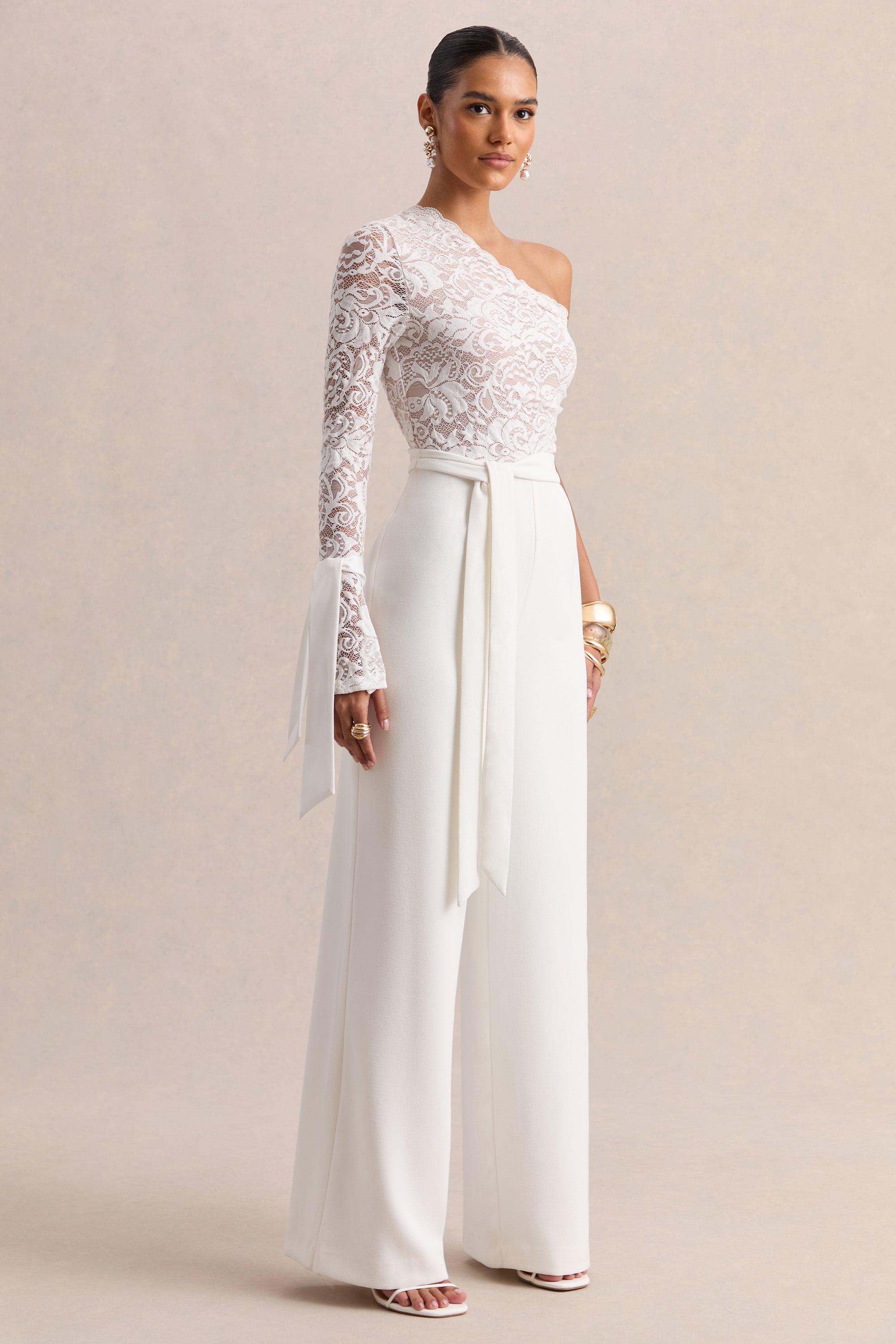 ECM_HR_CL137246110 - Clarence _ White Lace Asymmetric-Neck Jumpsuit With Bow-Details 01.jpg