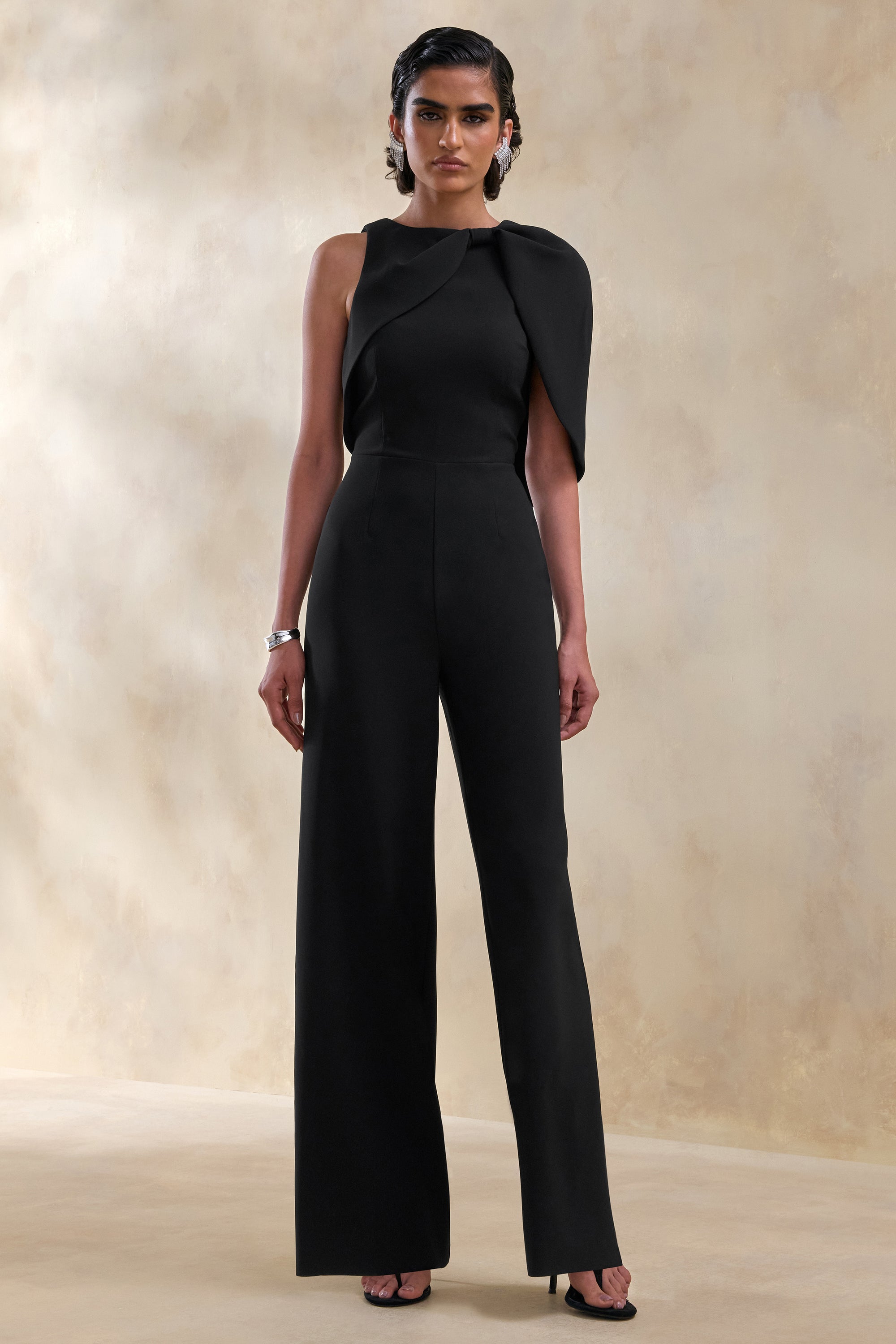 ECM_HR_CL137292001 - Quinley _ Black Asymmetric-Neck Jumpsuit With Cape-Sleeve 0.jpg