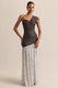 ECM_HR_CL137323021----Motira-_-Brown-Polka-Dot-Asymmetric-Neck-Maxi-Dress-With-Asymmetric-Drop-Waist-1_HERO_1.jpg