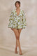 ECM_HR_CL138228110---Caron-_-White-And-Green-Floral-Broderie-Plunge-Neck-Playsuit0.jpg