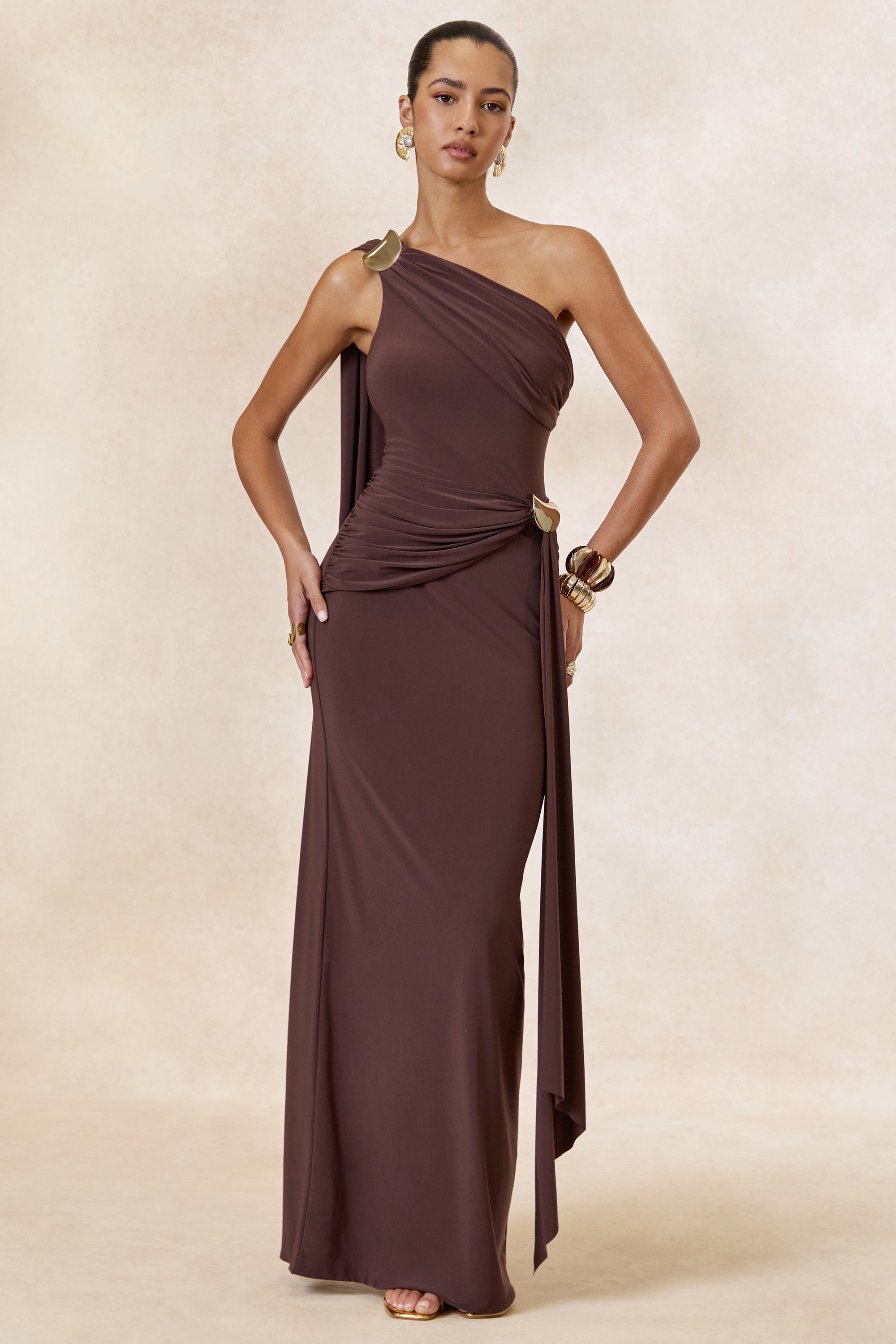 CL138426022 - Sariah _ Dark Brown Asymmetric-Neck Maxi Dress With Gathered Detailing And Gold Details1.jpg