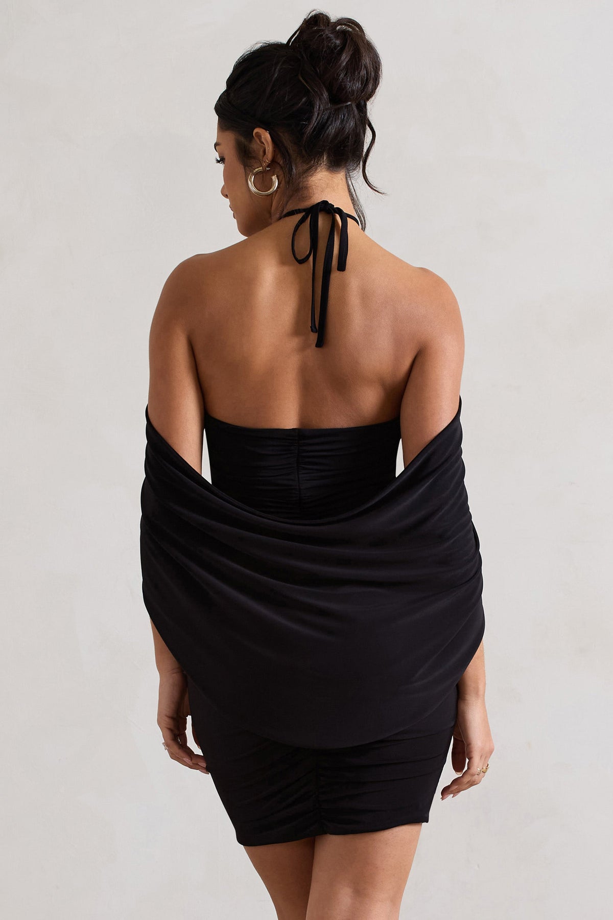 Adriana Black Ruched Halter-Neck Draped Mini Dress With Corsage Club L London - SA Adriana Black Ruched Halter-Neck Draped Mini Dress With Corsage Club L London - SA