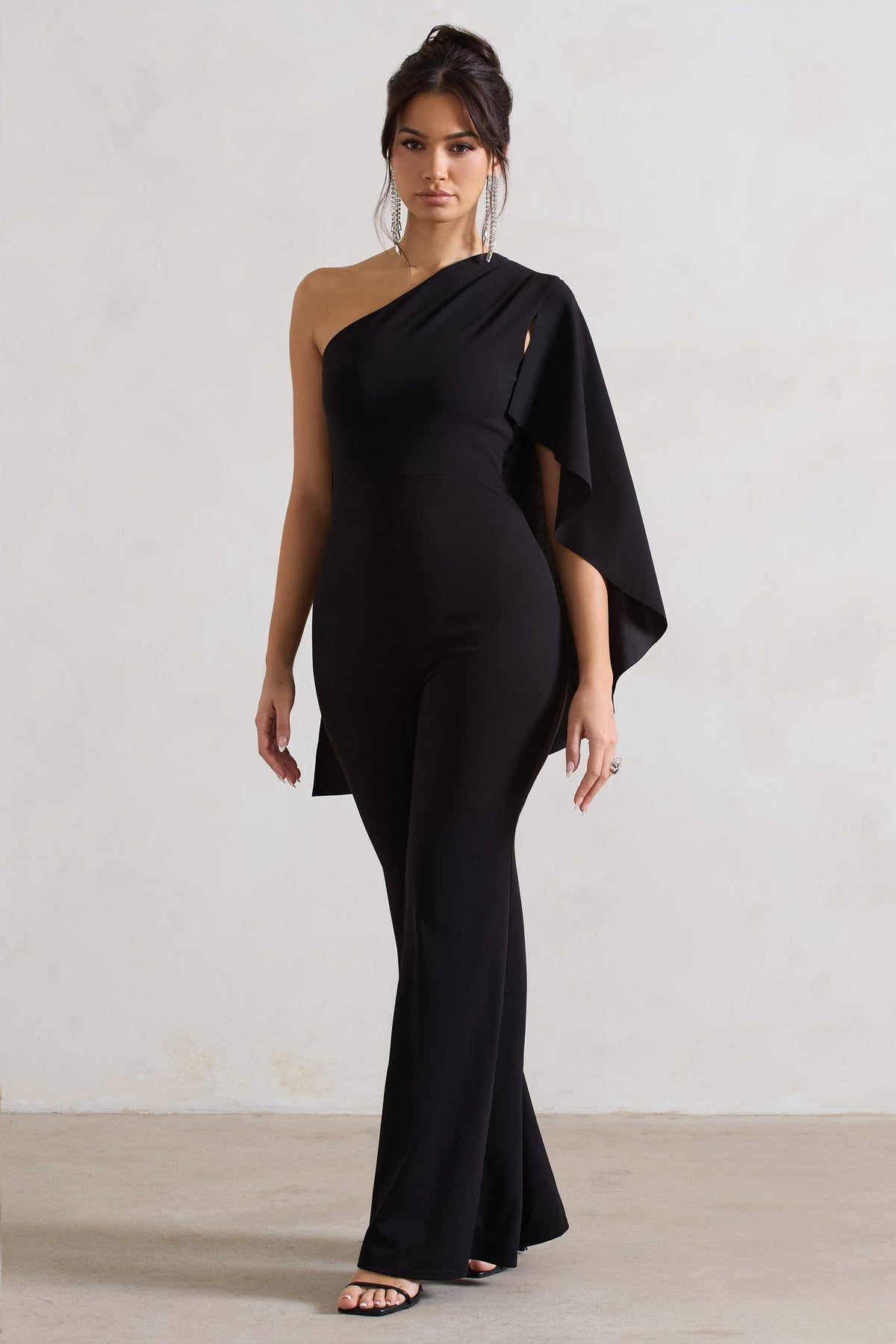 Pristine | Black Asymmetric Flared-Leg Jumpsuit With Cape Sleeve