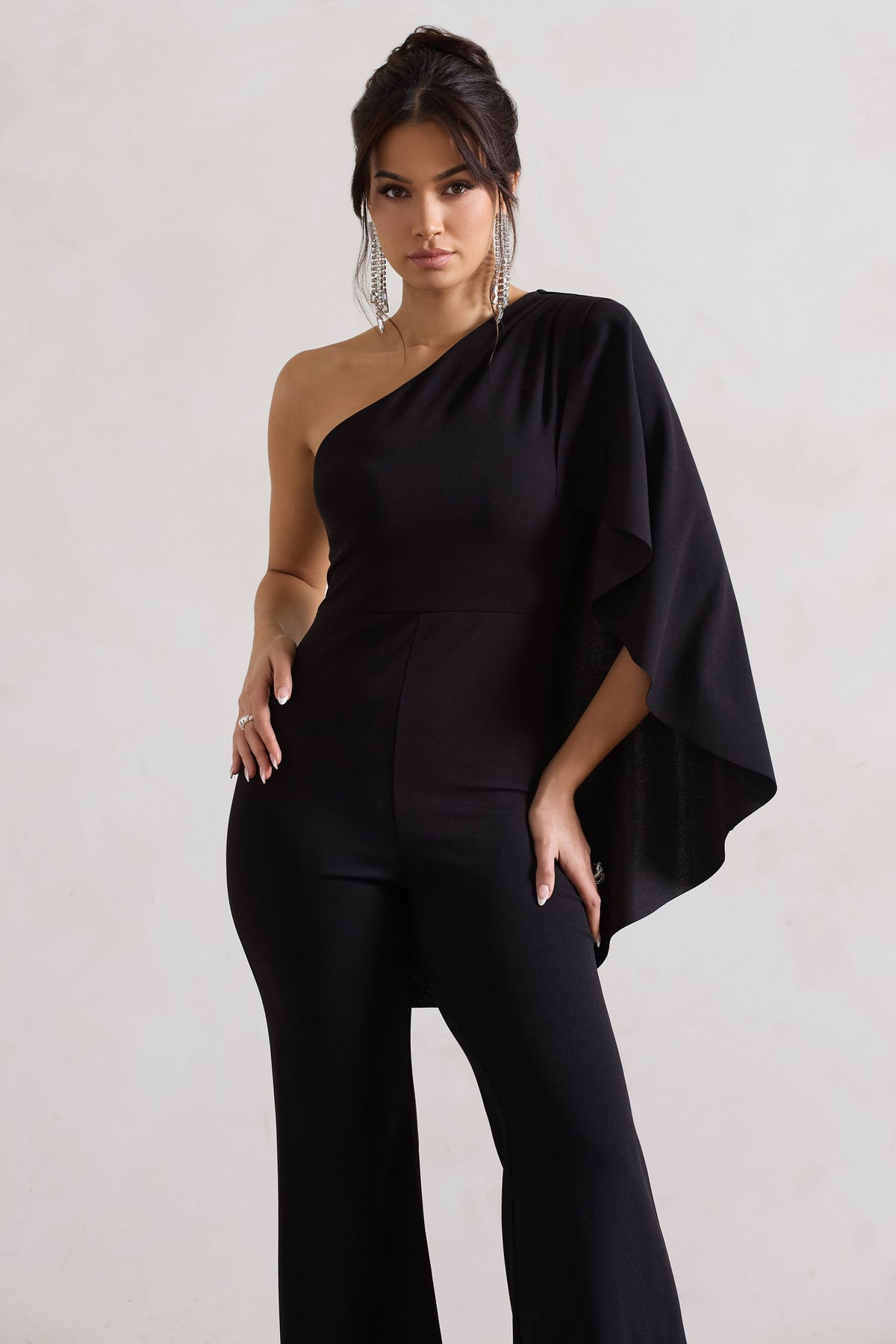 Pristine | Black Asymmetric Flared-Leg Jumpsuit With Cape Sleeve