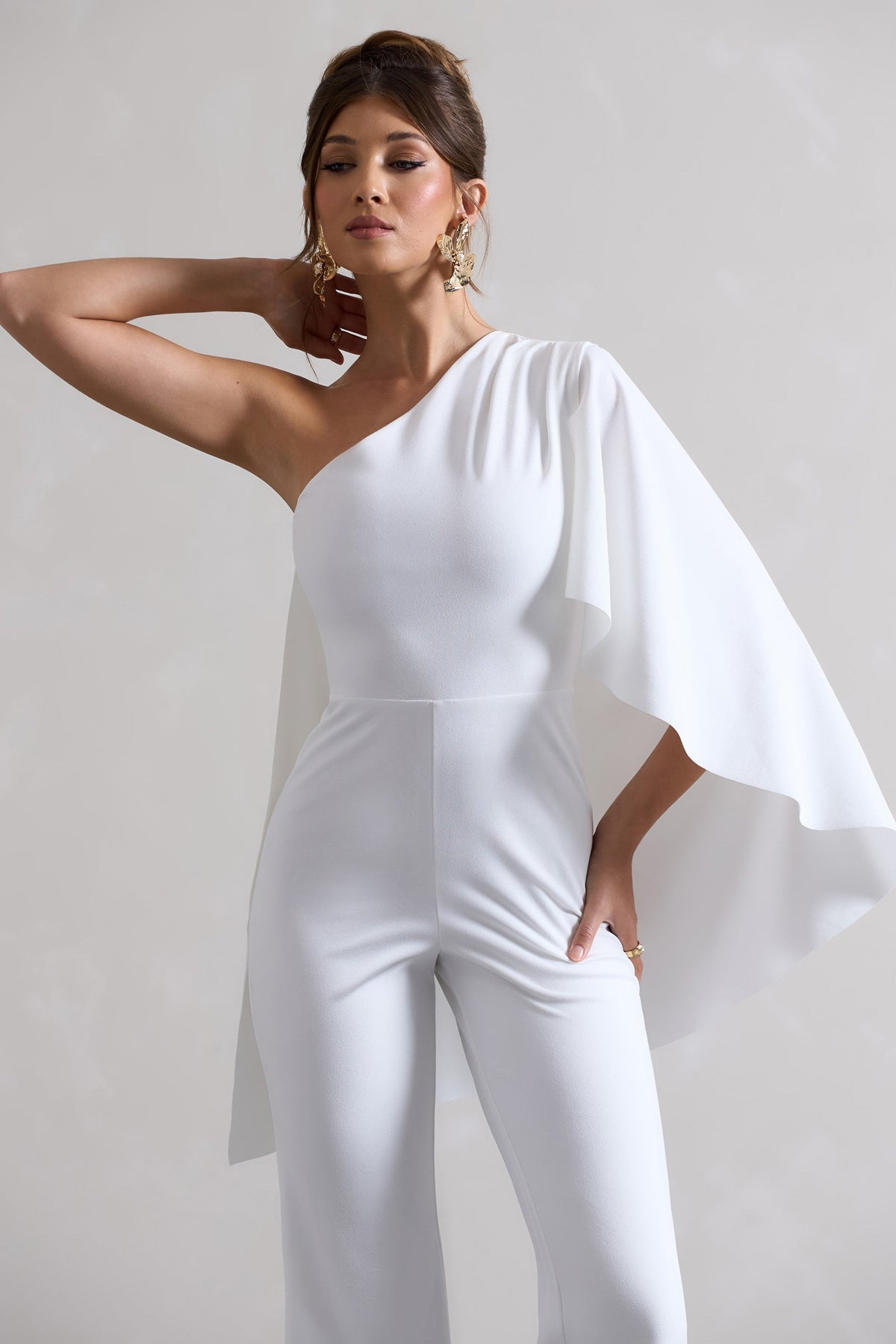 Pristine | White Asymmetric Flared-Leg Jumpsuit With Cape Sleeve